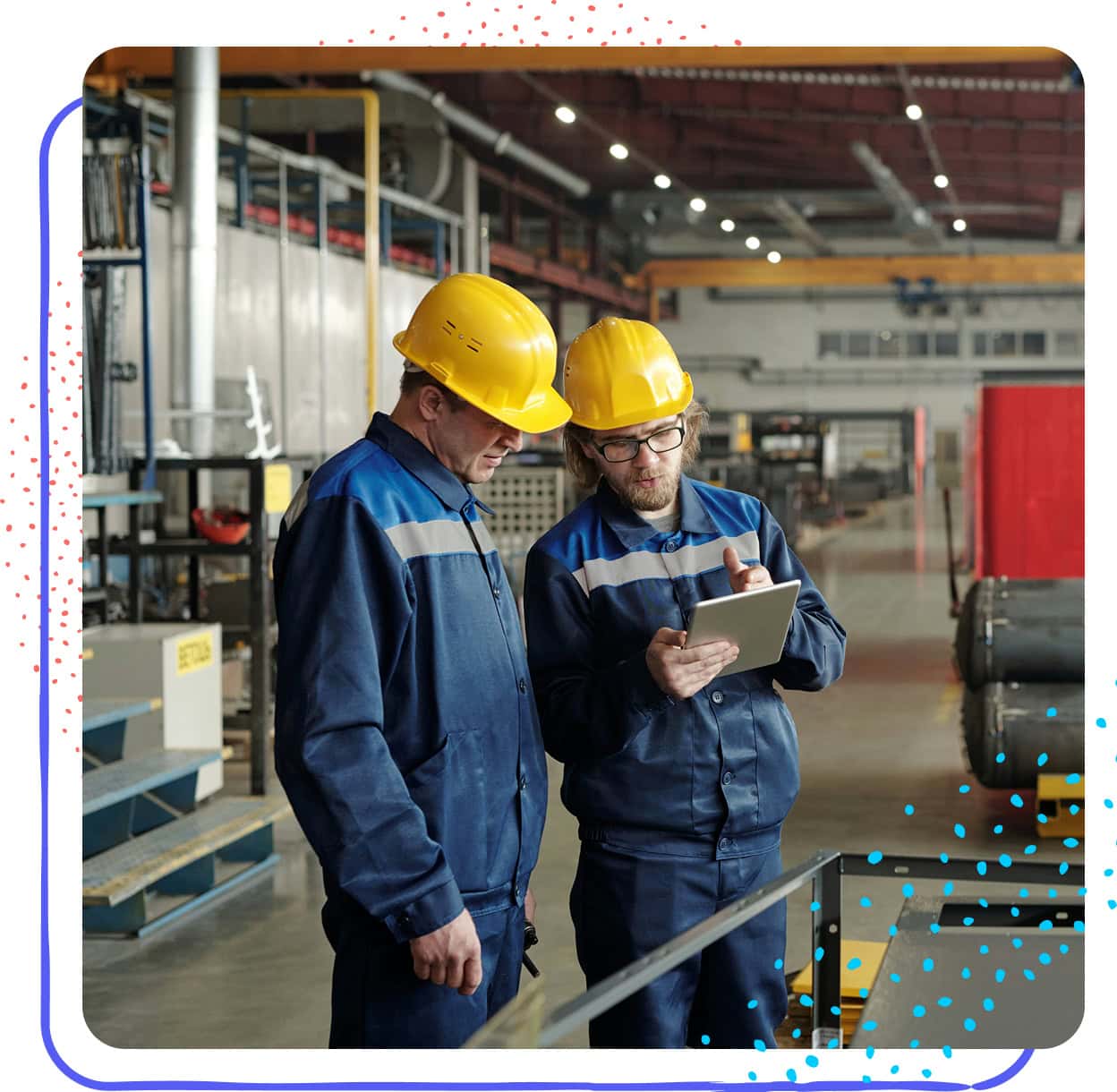 Factory Workers In Yellow Hardhats